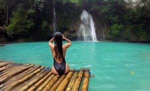 A girl rafting in kawasan falls