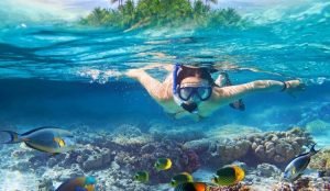 A girl snorkeling in Mactan Island Hopping